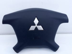 AIRBAG DELANTERO IZQUIERDO G46026754 / E2-B4-59-1 / 7030A099 MITSUBISHI MONTERO (V80/V90)