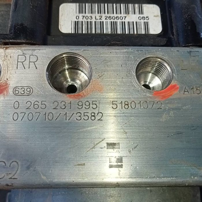 458023